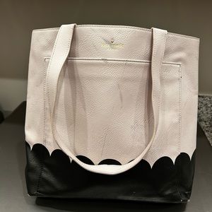 Gently used Kate Spade tote - pinkish/cream and black. Classic bow detailing!